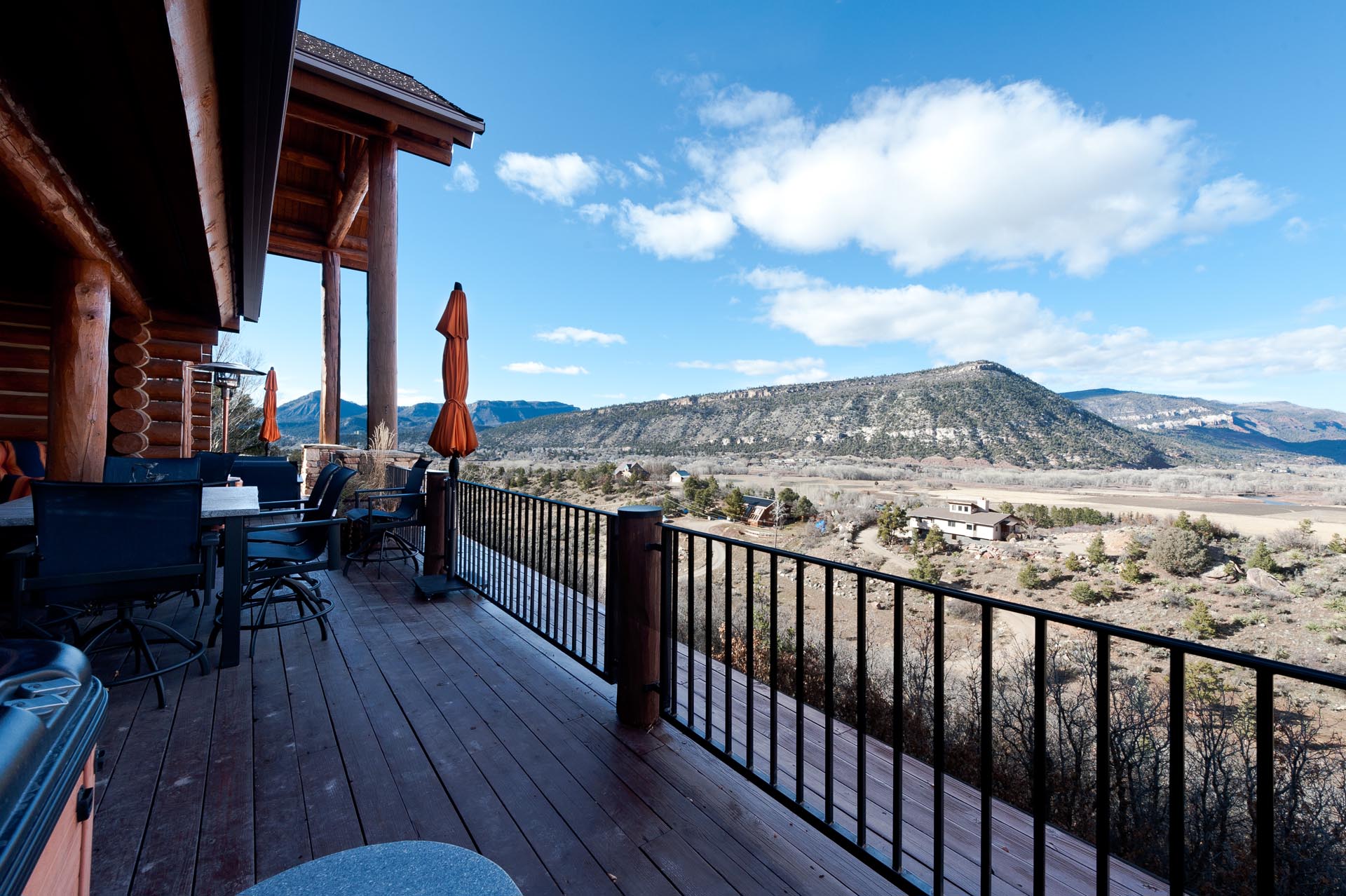 Amazing deck with views, hot tub, gas and wood buring fire pits, dining table, BBQ grill