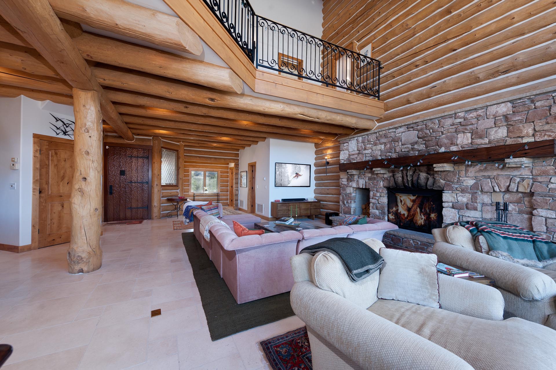 Main Living Space - Wood burning fireplace (wood provided) and amazing views through the picture windows