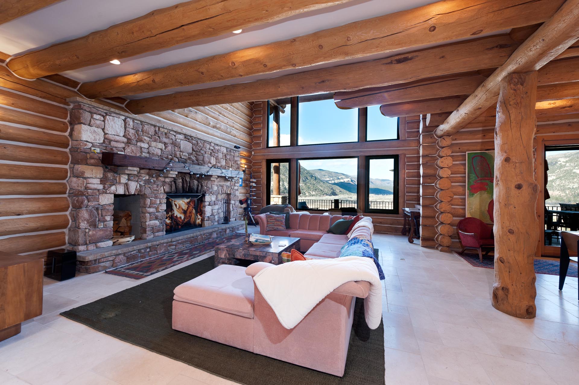 Main Living Space - Wood burning fireplace (wood provided) and amazing views through the picture windows