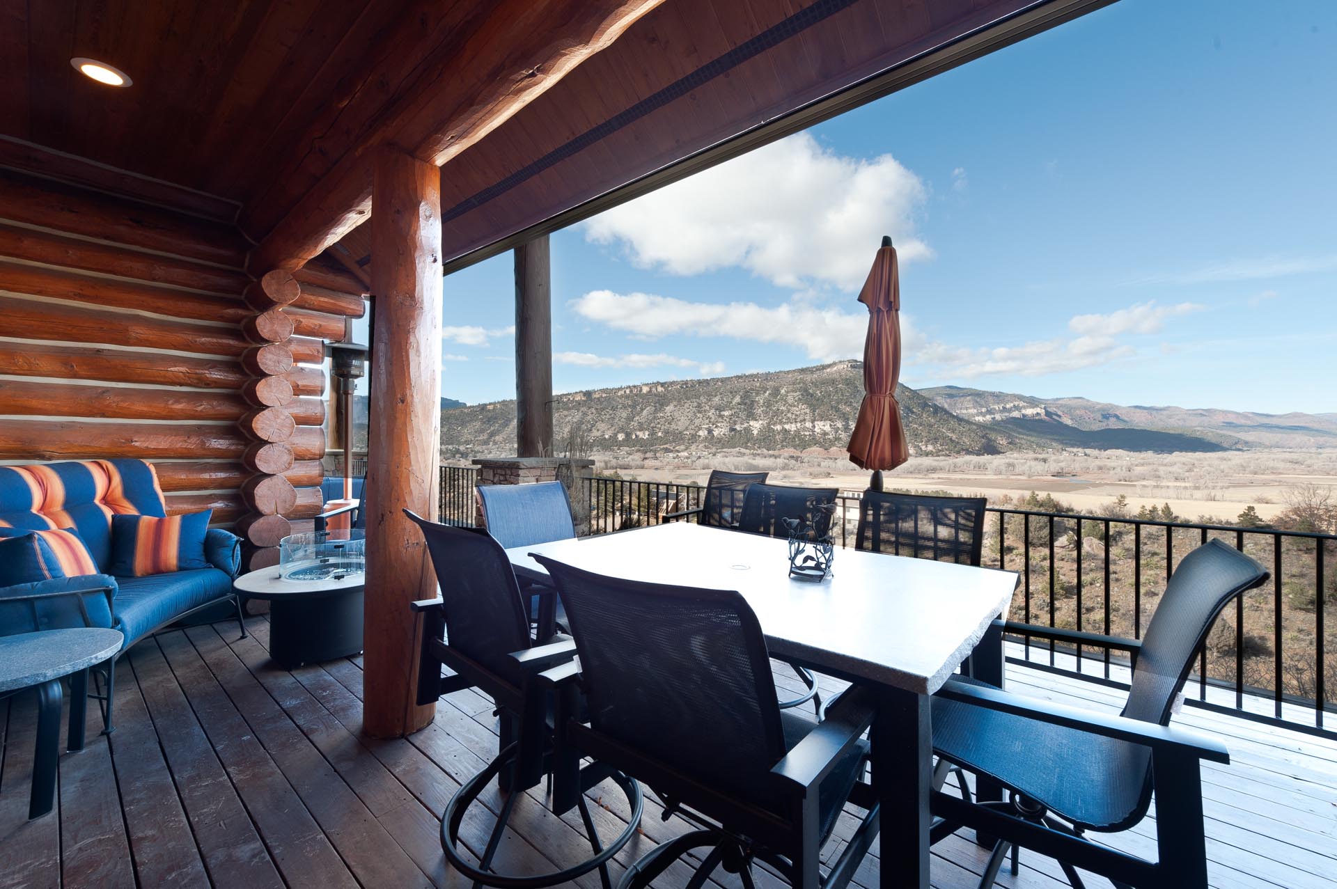 Amazing deck with views, hot tub, gas and wood buring fire pits, dining table, BBQ grill