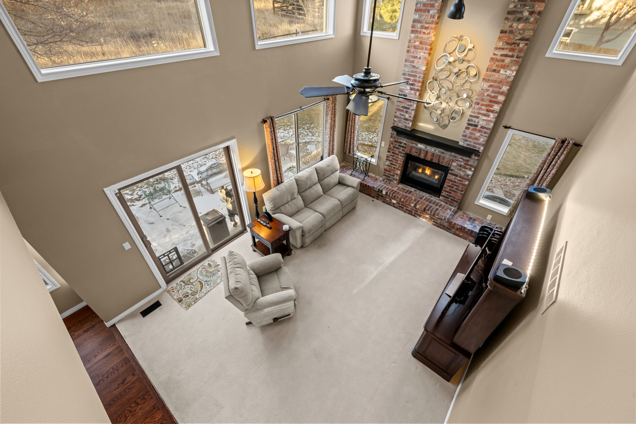 Welcoming entryway with hardwood staircase leading to upper bedrooms.Twilight exterior showing the home''s charming street presence and neighborhood setting.