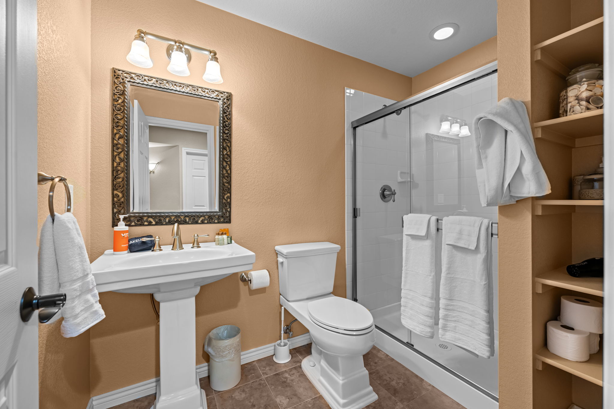 Shared hallway bathroom with walk-in shower