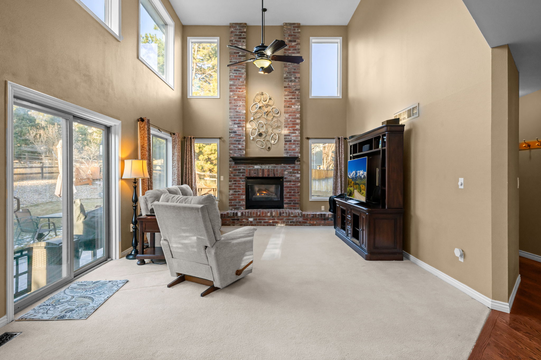 Comfortable living area with vaulted ceilings and modern finishes—perfect for lounging.Cheerful second bedroom with bold accent colors and comfortable bedding.