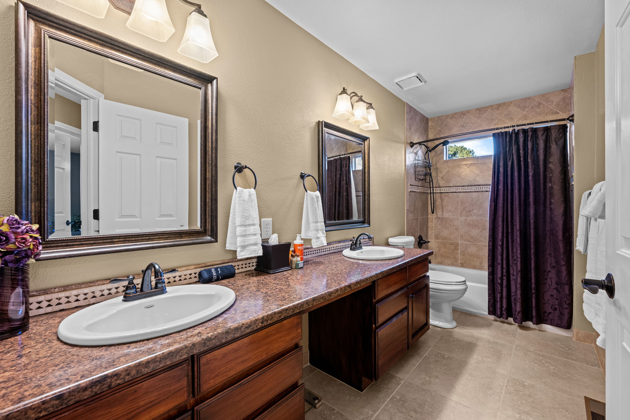 Clean, updated bathroom with tub/shower combo and modern fixtures.