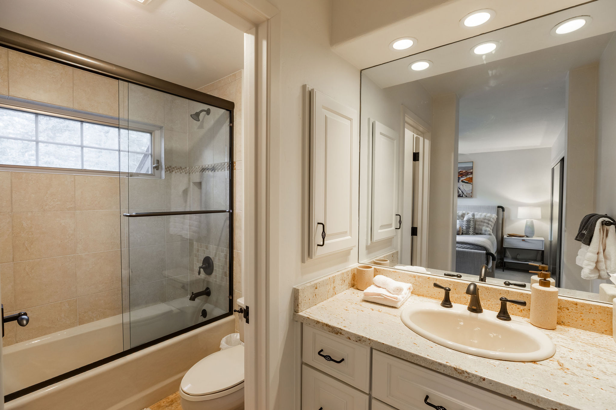 Ensuite bathroom #2 with a versatile tub/shower combo