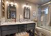 Dual vanities and tub/shower combo
