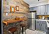 Bar seating area in kitchen.