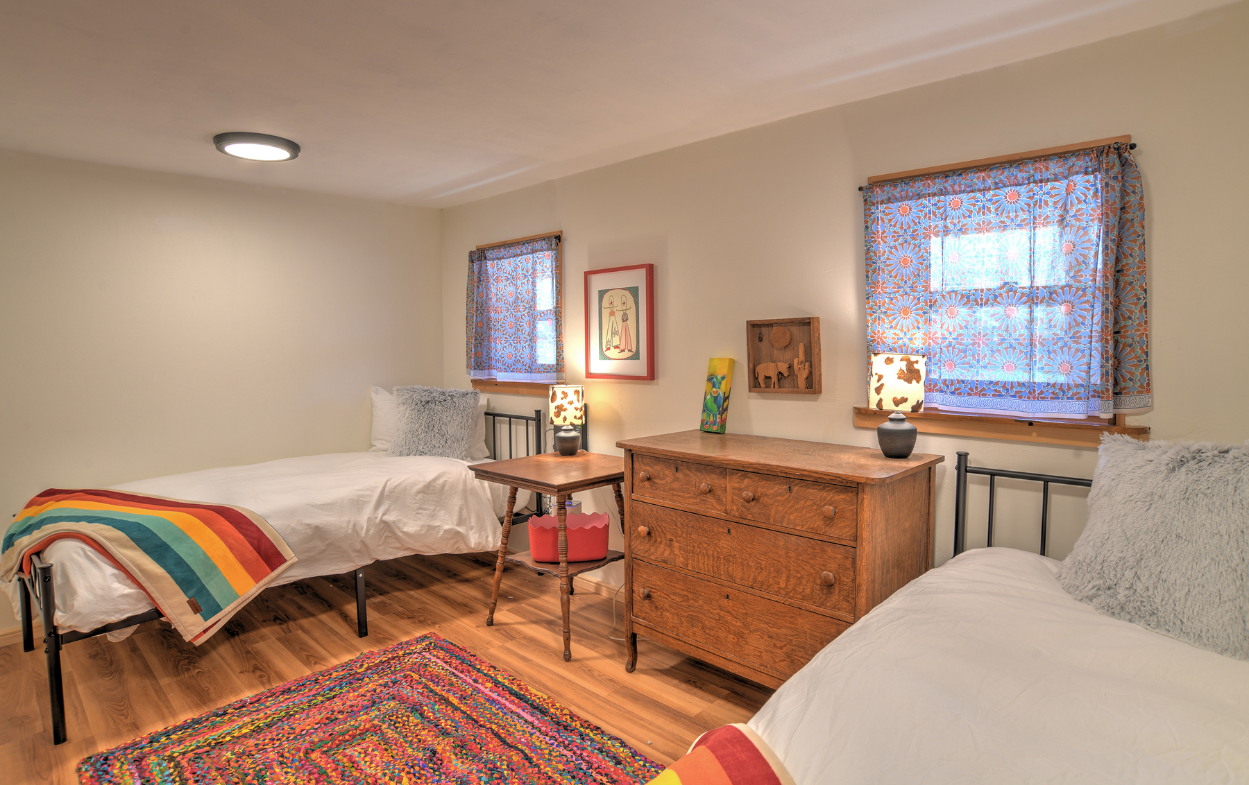 Fourth bedroom on the main level featuring two twin beds.