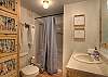 Shared hall bathroom main level.