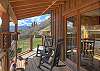 Covered east-facing porch, perfect for enjoying morning sunrises and relaxing afternoons.
