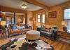 Our large living room is equipped with a Smart TV and reading nook. 
