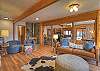 Open-concept living room that flows seamlessly into the kitchen and dining area.