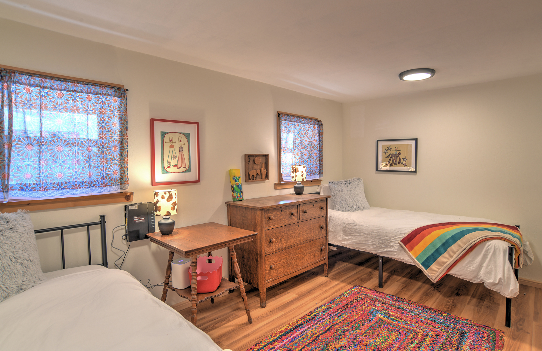 Fourth bedroom on the main level featuring two twin beds.