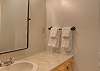 Private half-bath ensuite for second bedroom.