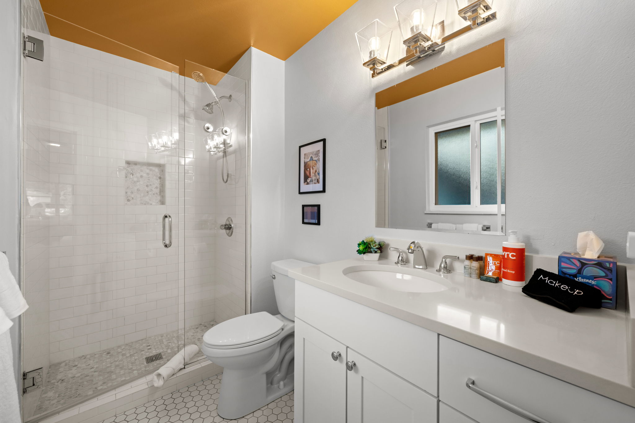 Full bathroom featuring a sleek walk-in shower.