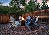 Gather around the fire pit in the backyard. 