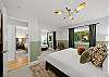 Peaceful nights and restful mornings start right here in the Primary King Bedroom