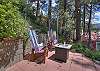 Gather around the fire pit and relax with family and friends on the patio. 