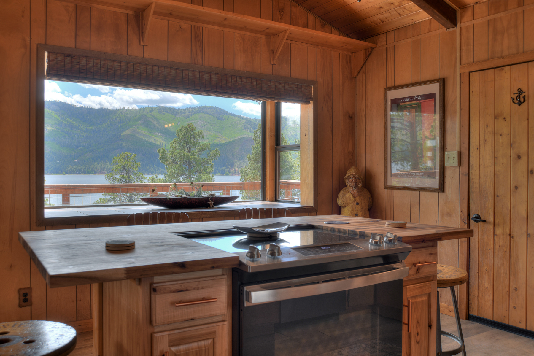 Enjoy beautiful lake and mountain views while cooking a meal in the kitchen. 
