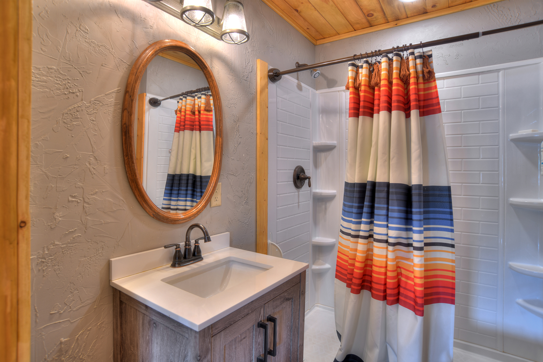 Clean and functional bathroom featuring a tub/shower combination.
