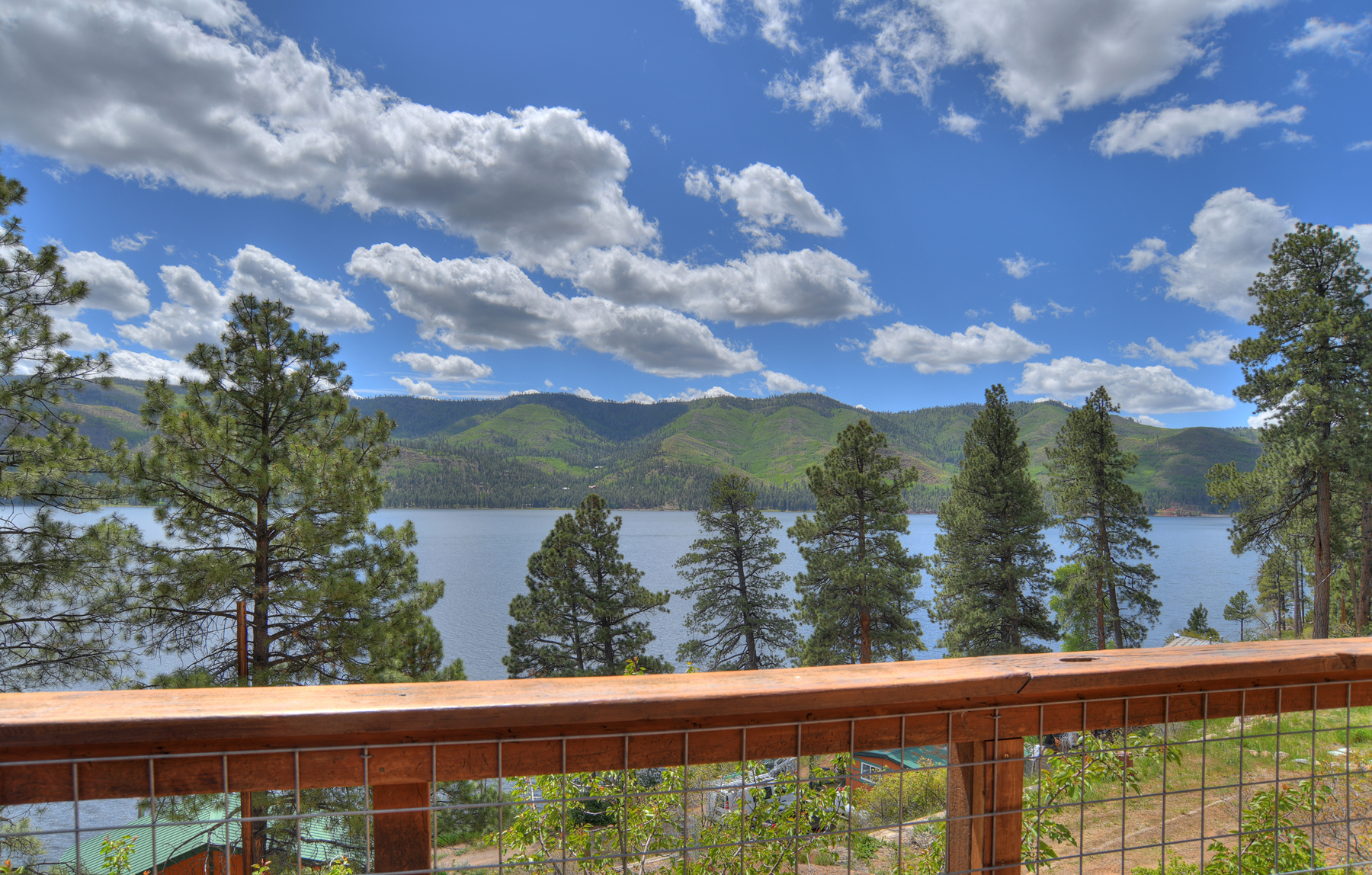 Step out onto the deck and see stunning lakefront and mountain views of Lake Vallecito.