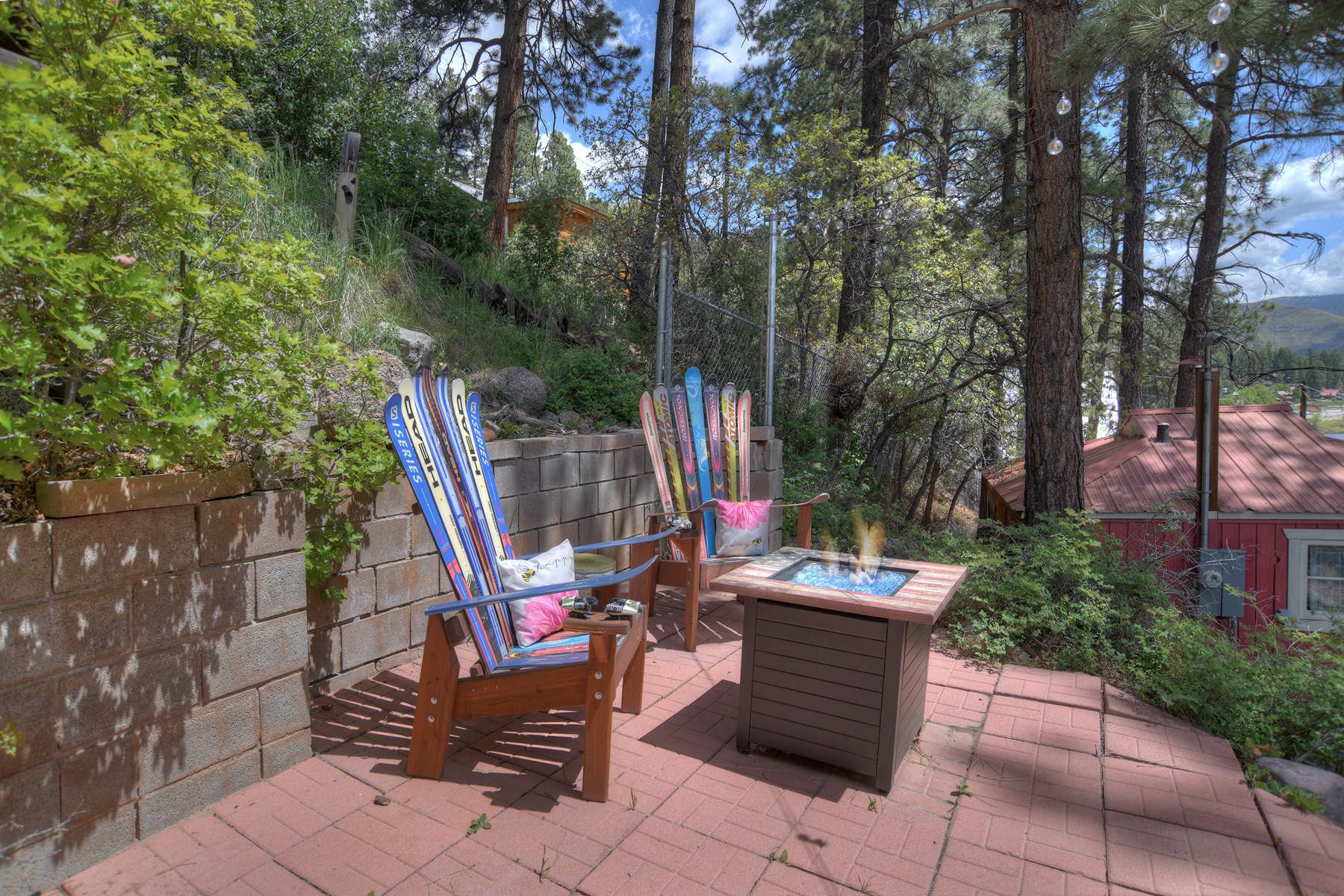 Gather around the fire pit and relax with family and friends on the patio. 