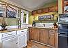 Well equipped kitchenette with lake house charm! 