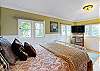 Cosy studio with space to relax – including a queen bed, smart TV, and plenty of natural light. 