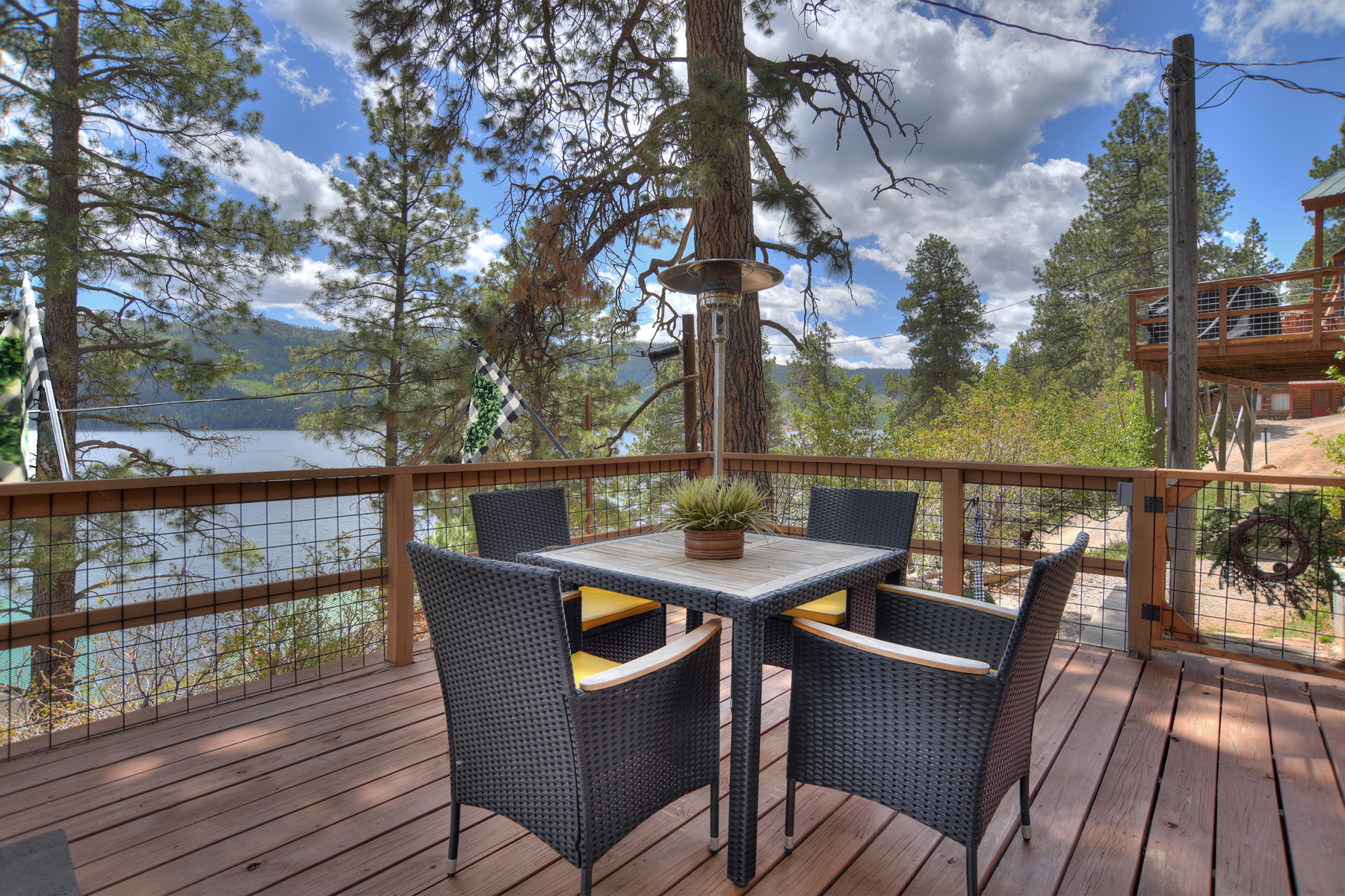 Relax, grill, and take in the lake and mountain views from the private deck. 