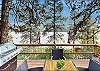 Relax, grill, and take in the lake and mountain views from the private deck. 
