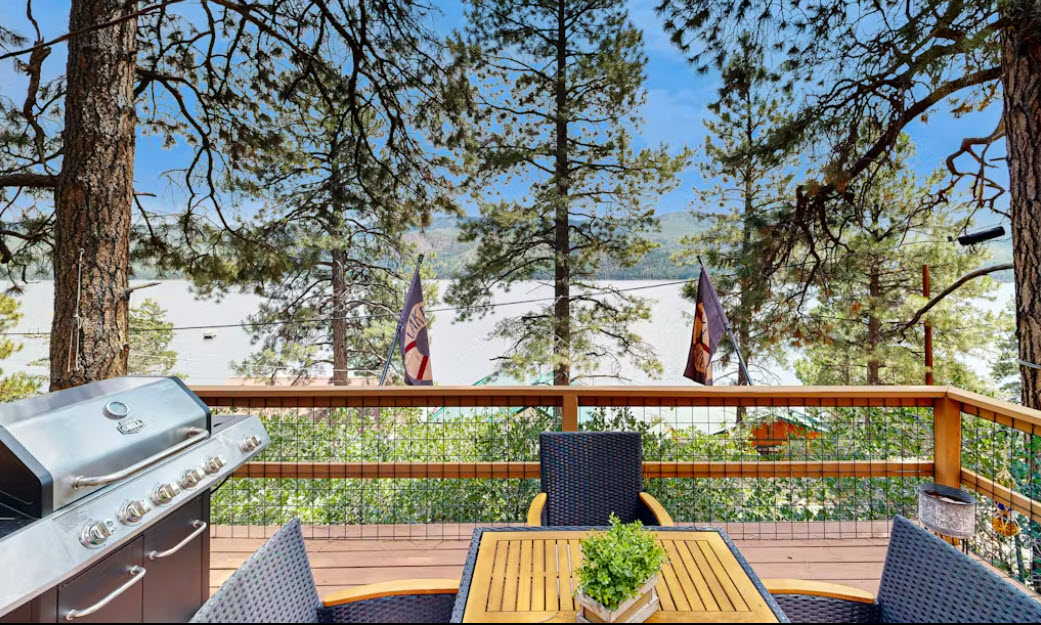 Relax, grill, and take in the lake and mountain views from the private deck. 