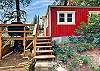 Exterior Staircase that leads to Deck Access with Mountain and Lake Views