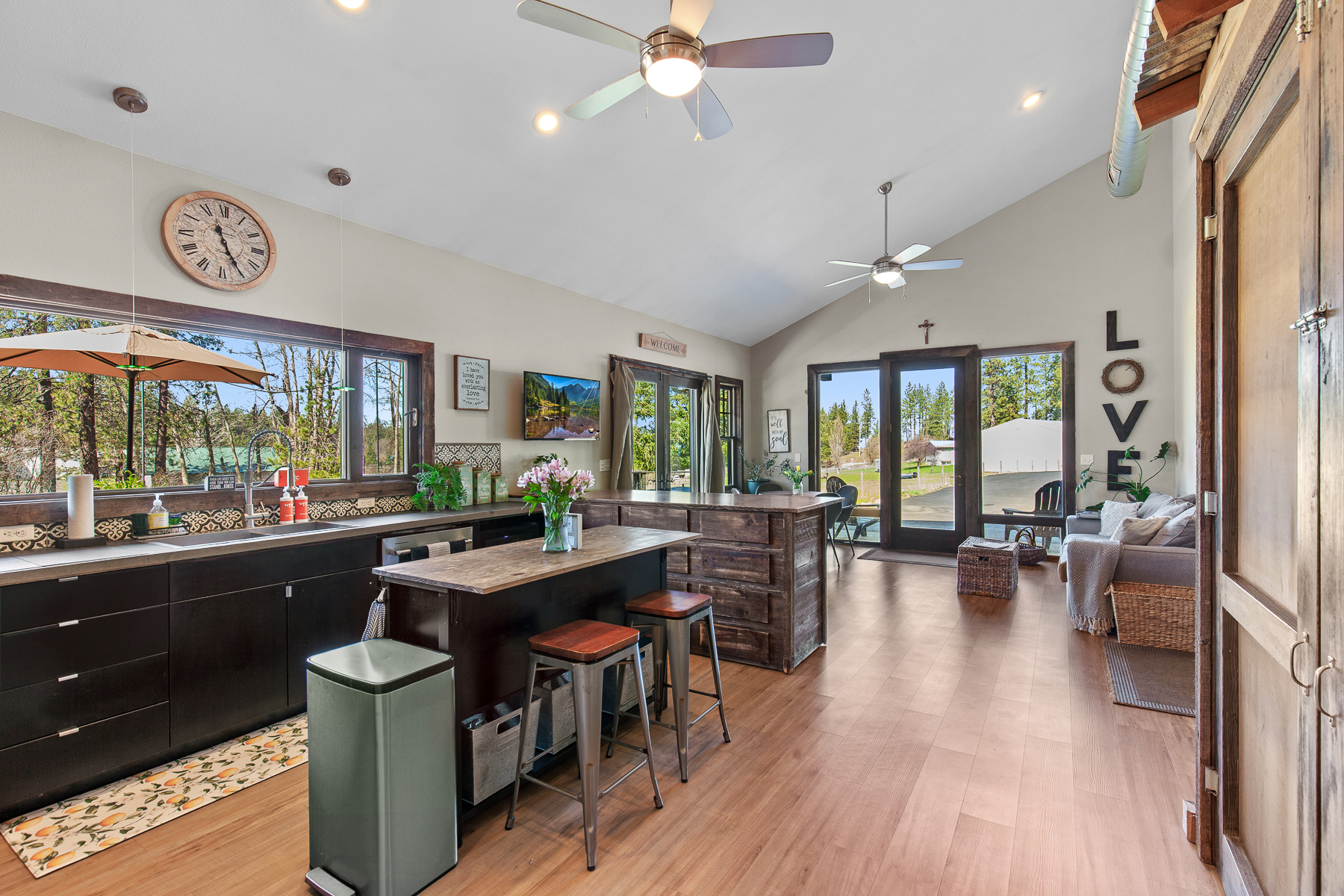 An open-concept kitchen designed for togetherness keeps the good times flowing to the living space