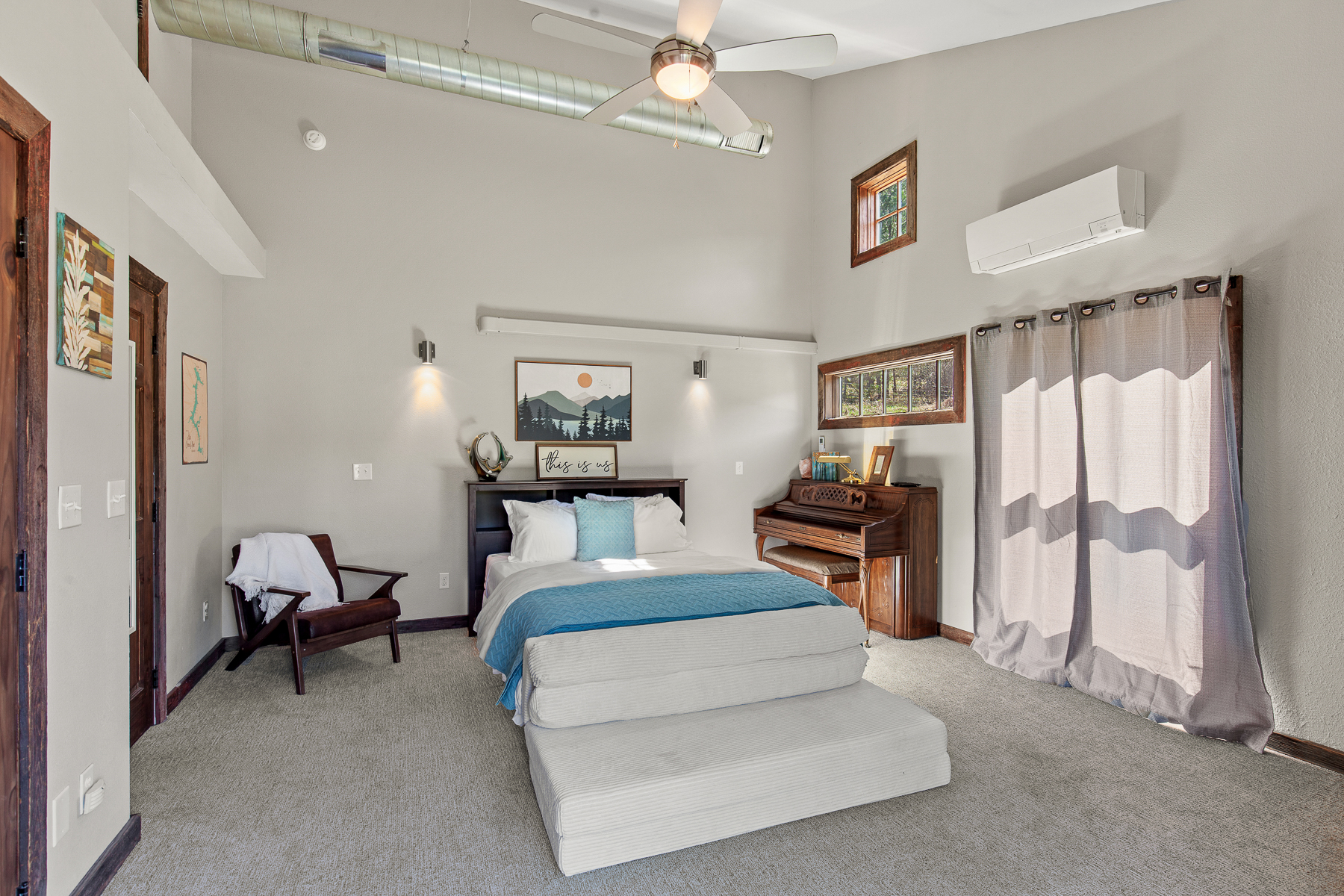 Relax and recharge in this cozy queen bedroom retreat with patio access.