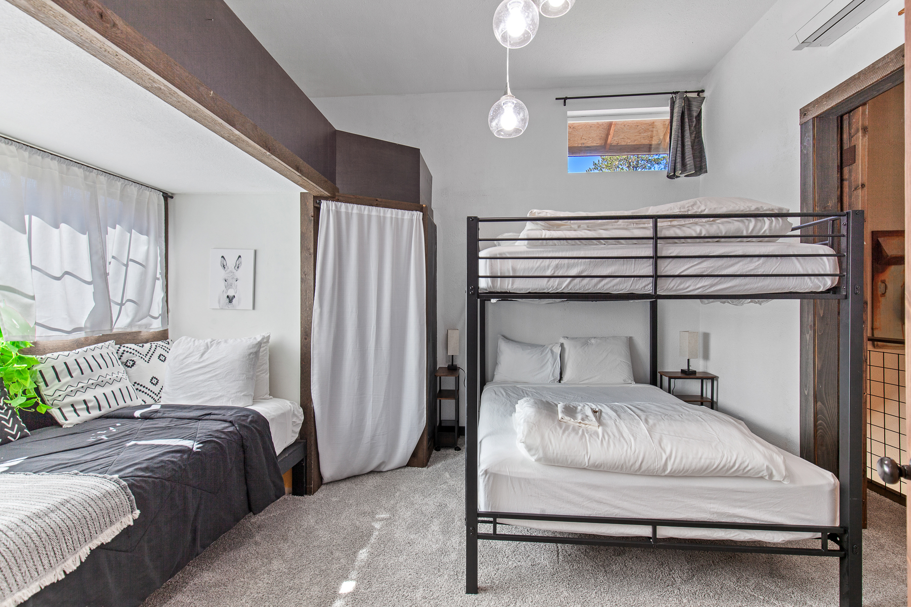 Loft Room on the 2nd level. Queen/Queen Bunk and Twin Bed— ideal for flexible sleeping arrangements