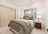 Relax and recharge in this cozy queen bedroom retreat.