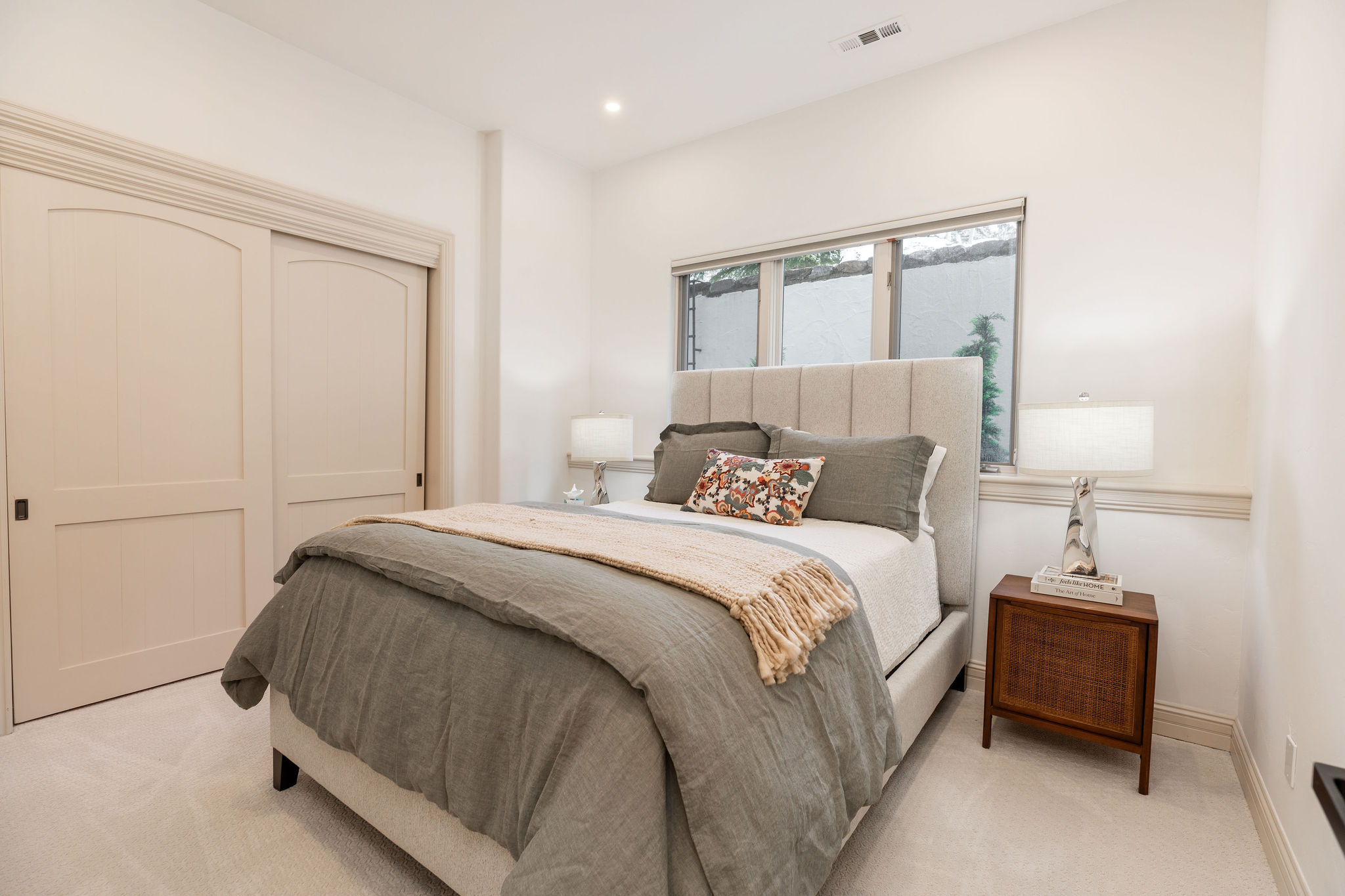 Relax and recharge in this cozy queen bedroom retreat.