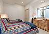 Bright and clean twin bedroom, perfect for a comfortable stay.