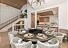 Enjoy meals together around a table that comfortably seats 8.
