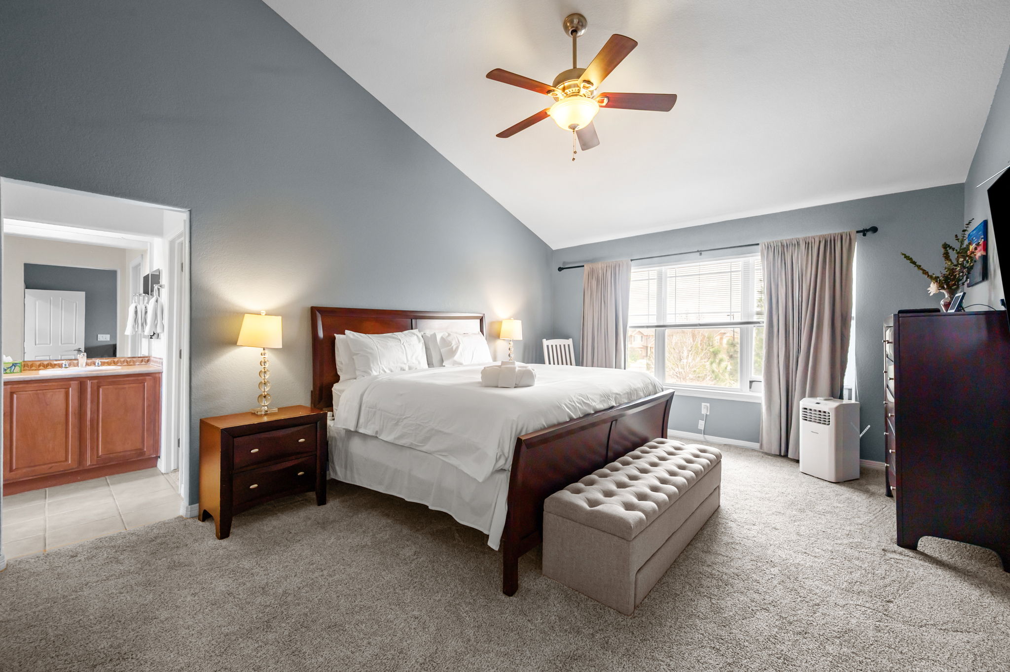 Unwind in this spacious king bedroom with an ensuite and a Smart TV—comfort and entertainment in one.