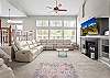 Cozy up in style- this living room is perfect for relaxation and gathering.