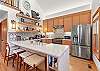 Whip up your favorite meals in this beautifully designed kitchen