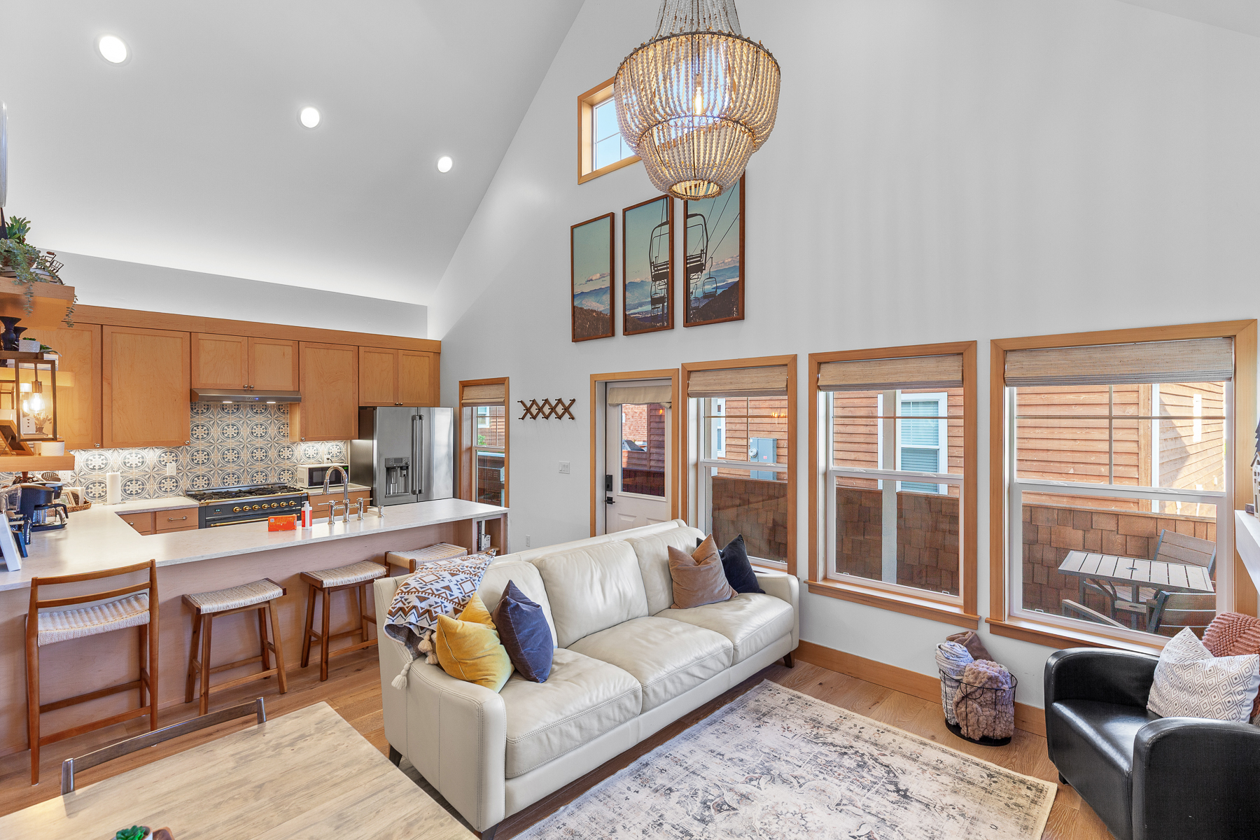 Open living room and dining area with plenty of natural light. 