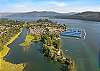 Bird's-eye view of our property's prime location – with Lake Pend Oreille and the community marina just steps away.