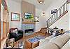 Cozy up in style- this living room is perfect for relaxation and gathering.
