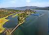 Bird's-eye view of our property's prime location – with Lake Pend Oreille and the community marina just steps away.