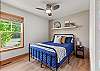 Bright and clean queen bedroom, perfect for a comfortable stay – sleeps 2. 