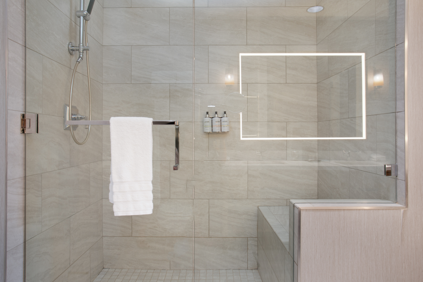 Full bathroom featuring a sleek walk-in shower.