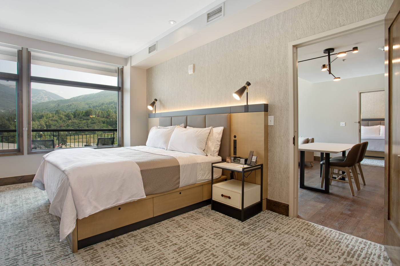 Unwind in this spacious king bedroom with a Smart TV and desk.