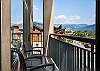 Enjoy the panoramic mountain views on the balcony.